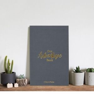 Grey and gold "Our Family" Haven Home fold out photo album